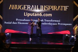 Dirut PNM dinobatkan sebagai Penggerak Transformasi Sosial Ekonomi dan Pemberdaya Perempuan