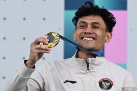 Kado indah Veddriq Leonardo untuk terawatnya tradisi emas Olimpiade