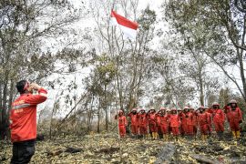 Manggala Agni upacara HUT RI ke-79 di lokasi kebakaran lahan gambut Lempuing Page 1 Small