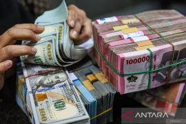 Analis: Rupiah berpotensi melemah kendati BI pangkas suku bunga