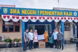 Distribusikan 28 komputer, Komitmen PTPN IV perkuat cyber education sekolah pinggiran
