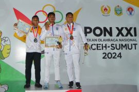 PON XXI Aceh - Sumut: Final lari 100 meter putra Page 1 Small