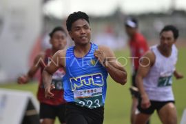 PON XXI Aceh - Sumut: Final lari 100 meter putra Page 2 Small