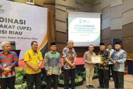 Mitra pendukung payroll system, BRK Syariah terima penghargaan dari Baznas Riau