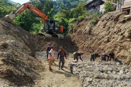 TMMD Kodim 1306/Palu upaya mitigasi bencana dengan normalisasi sungai