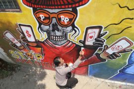 Mural cegah judi online oleh polisi