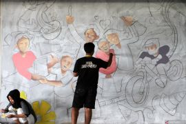 Lomba mural bertema vintage di Malang