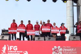 Polwan Polres Mabar  raih juara kategori local female 10K IFG LBM