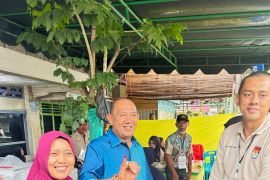 Syah Afandin nyoblos di TPS 5 Jalan Stasiun Kelurahan Brandan Timur