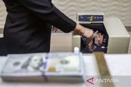 Analis nilai pelemahan rupiah dipengaruhi sentimen kebijakan Trump
