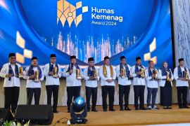 Humas Kanwil Kemenag Riau raih penghargaan  pengelola website terbaik 2024
