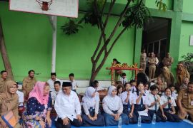 Free meals program will continue to be improved: Minister