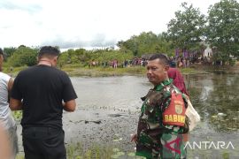 Babinsa ingatkan masyarakat waspadai buaya di waduk