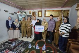 Pemerintah Kota Jambi bersama BPJS Ketenaga kerjaan santuni petugas KPPS