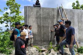 52 tahun kesulitan air, Desa Lowu-lowu kini nikmati sumur bor dari PT BGM