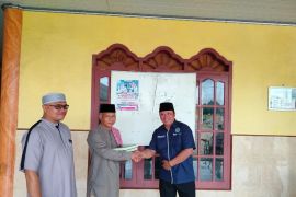 IWO Lampung Timur wakaf Al Quran  di Masjid Al-Barokah Desa Sidorejo