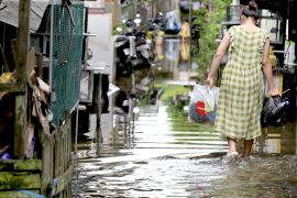 Banjir rob dan genangan air akibat hujan di Banjarmasin