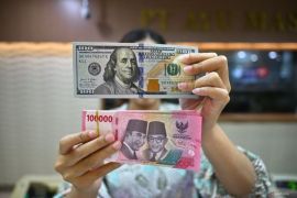 Rupiah menguat karena Presiden AS minta suku bunga AS turun