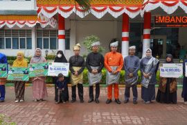 Pj Bupati Langkat serahkan santunan Jaminan kematian