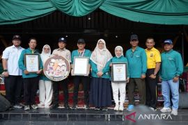 Kampar pecahkan rekor MURI sajian makanan 1.373 porsi Gulai Ikan Salai Patin pada hari jadi ke-75