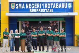 PGI introduces students to golf in Kotabaru