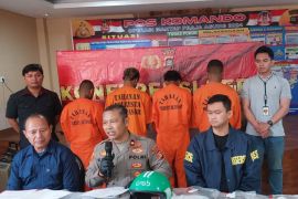 Polisi tangkap empat pengeroyok sopir taksi di Kuta Selatan