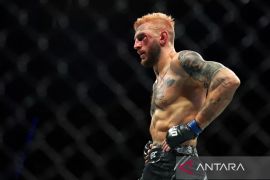 Justin Gaethje rebut gelar juara kelas ringan usai menang TKO atas Ilia Topuria di UFC Freedom 250