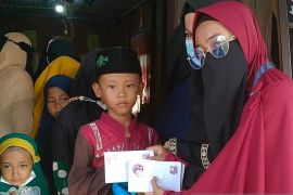 Komunitas For Yatim Jambi berbagi kebahagiaan di bulan Ramadhan
