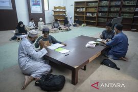 Belajar mengaji anak tuna rungu