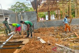 TMMD building MCK in Talusi Village Kotabaru
