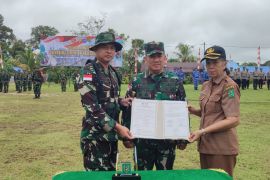 TNI menyelesaikan pembangunan jalan di perbatasan melalui program TMMD