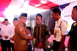 Sinergi Kemenkum dengan Pemprov Banten, gelar bazar dan berbagi santunan