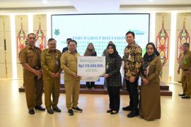 Pemkab Kapuas luncurkan program perlindungan bagi 10.000 pekerja rentan
