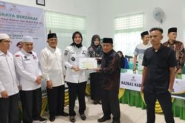 Bupati Dharmasraya ajak masyarakat salurkan zakat melalui Baznas