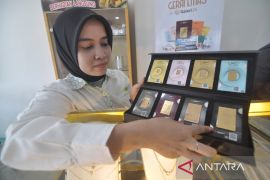 Harga emas Antam naik