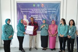 PKK Kalbar Serahkan Bantuan dan Tanam Harapan di Lapas Perempuan Pontianak