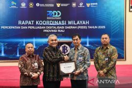 BRK Syariah berperan aktif dalam akselerasi digitalisasi keuangan daerah, BI Riau beri penghargaan