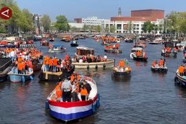 Serba oranye dalam perayaan Hari Raja di Belanda