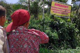 Ancaman kerusakan alam, TNI pasang spanduk larangan PETI di Aek Natas