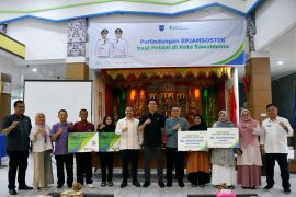 Pemkab Sawahlunto-BPJamsostek perpanjang perjanjian perlindungan pekerja mandiri