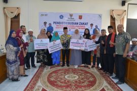 Baznas Agam salurkan Rp181,07 juta bantu 164 mustahik