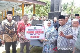 Bupati Kasmarni Serahkan Perangkat MOLDUK Portable di Talang Muandau