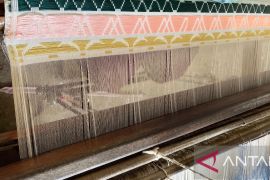 Balang Manarangi: Ketika Keagungan Harimau Sumatra menjelma dalam elegansi songket