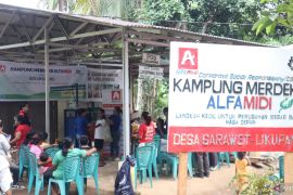Retail modern dan BSI Likupang edukasi warga kelola sampah jadi uang