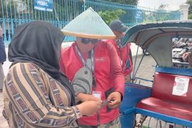 Penerapan sistem pembayaran nontunai di Solo merambah ke transportasi tradisional