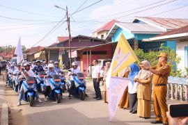 Kirab Bangga Kencana, simbol penguatan keluarga berkualitas di Payakumbuh