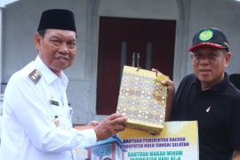 Wabup HSS serahkan bantuan ribuan porsi makanan untuk haul Guru Kapuh