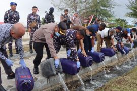 Polres Aru  lakukan pemusnahan barang bukti minuman keras tradisional