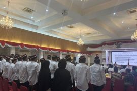 Ex-terror group members pledge allegiance to Indonesia