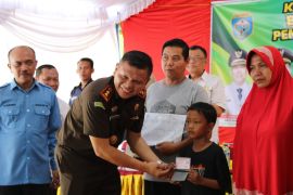 Kejari OKU kawal pencetakan dokumen kependudukan warga kurang mampu melalui Program Adiyaksa Peduli Anak Umang